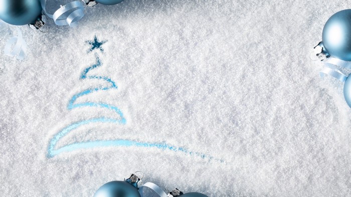 Christmas tree drawn in snow with blue ornaments
