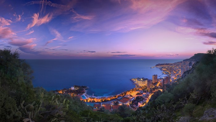 Monaco cityscape at dusk overlooking the sea