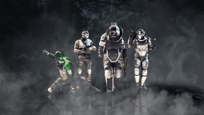 Four soldiers in tactical gear in a smoky environment