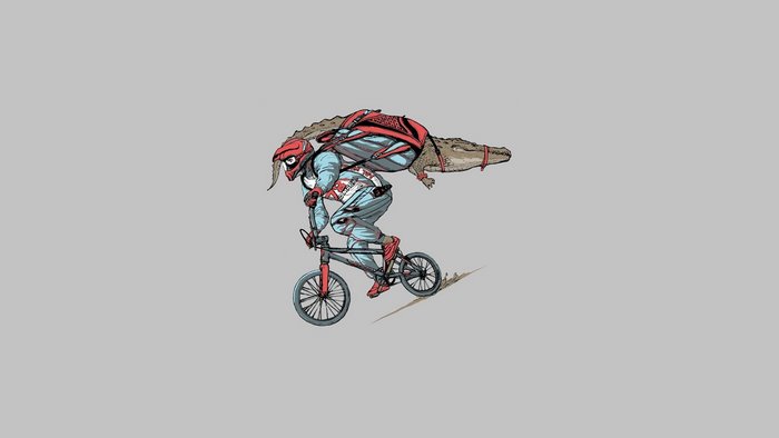 Man on BMX carrying a crocodile on his back