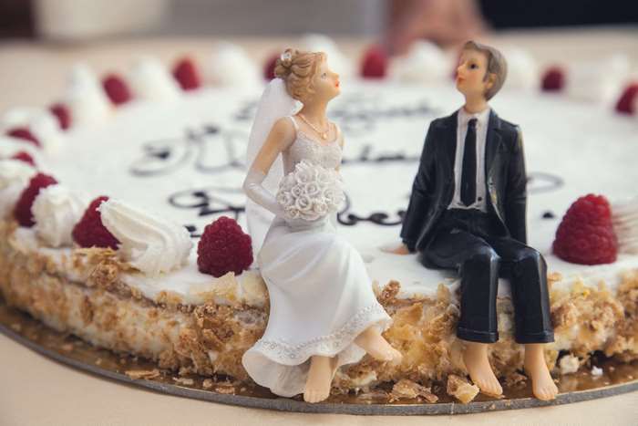 Wedding cake with bride and groom figurines