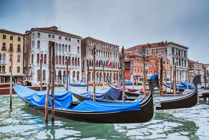 Gondolas on a canal in Venice, Italy 4K