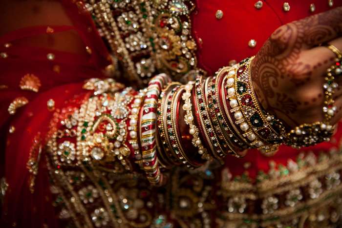 Indian Bride's Hands with Bangles and Henna