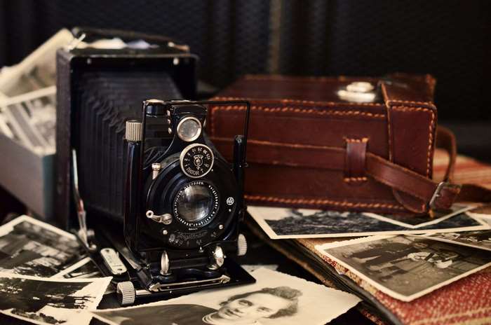 Vintage camera and old photographs