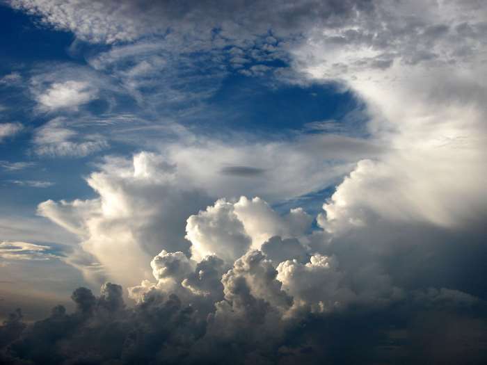 Dramatic sky with cumulus clouds