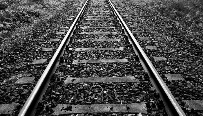 Black and white image of railway tracks