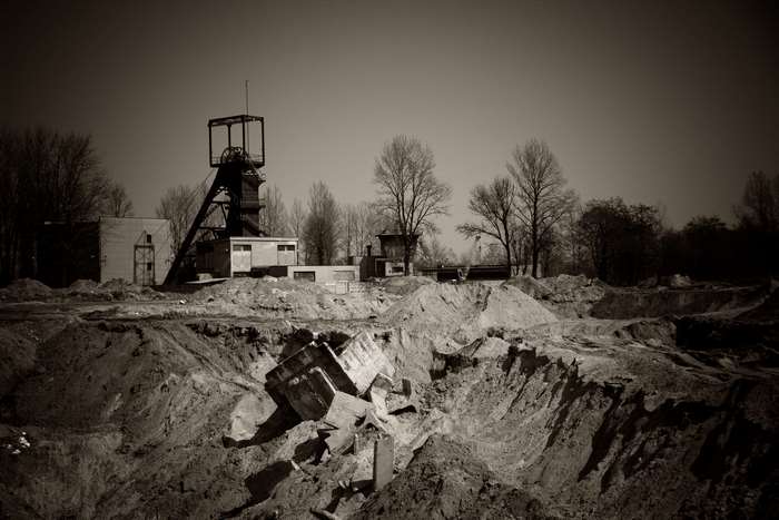 Mine landscape with headframe and debris