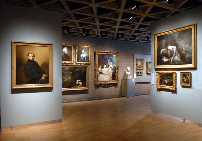 Art gallery with paintings and sculptures