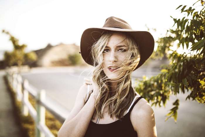 Woman wearing a hat outdoors