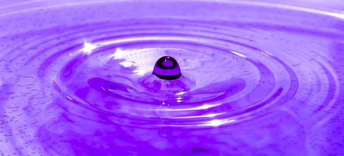 Purple Water Drop Ripple Close-Up