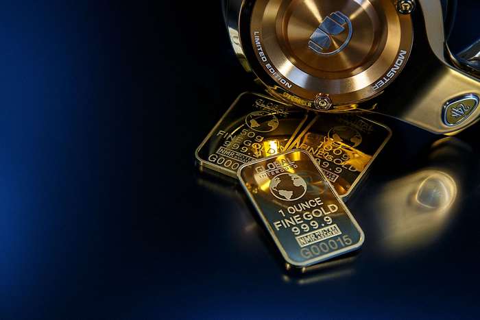 Gold bars and a gold reel with "Limited Edition" and "Monster" text