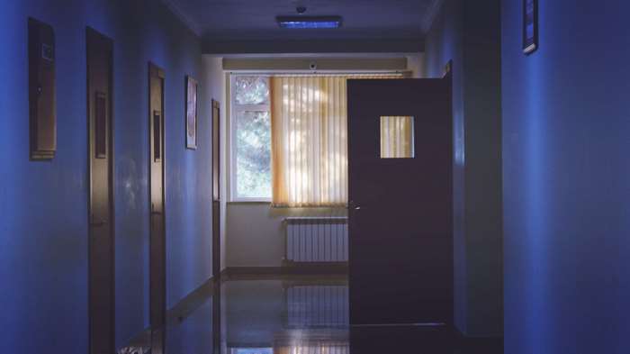Hallway with doors and window