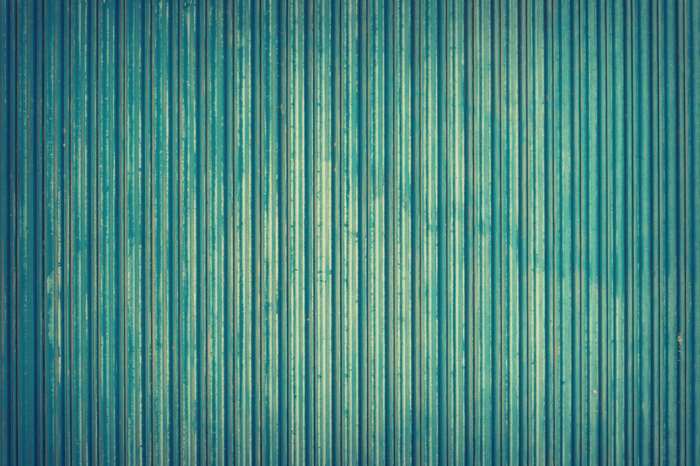 Blue corrugated metal sheet texture
