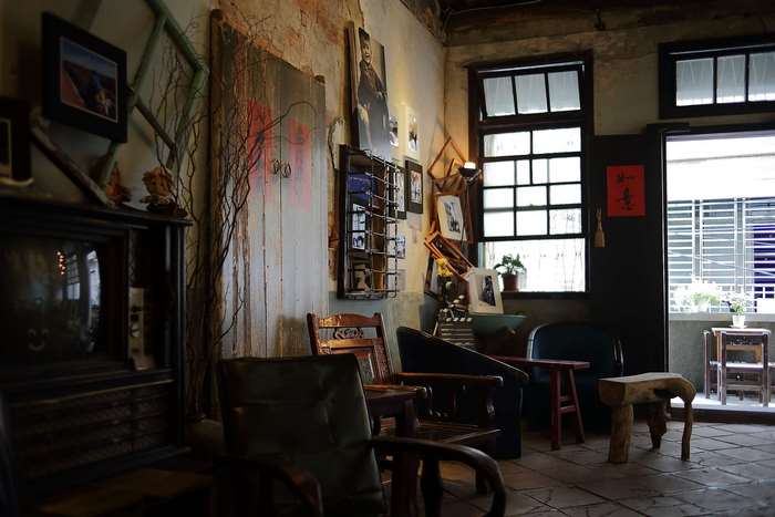 Vintage cafe interior with wooden furniture and decor