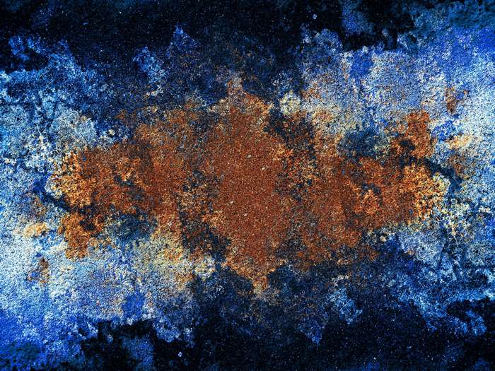 Abstract blue and rust textured background