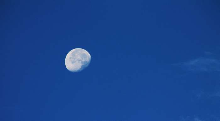 The Moon in a Clear Blue Sky