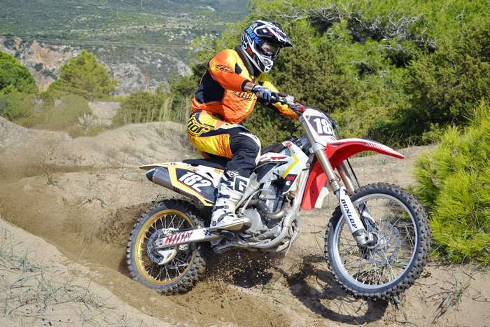 Motocross rider on a dirt track