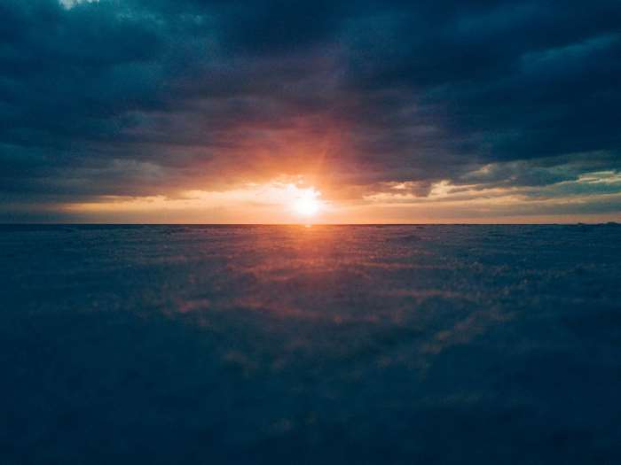 Sunset over clouds