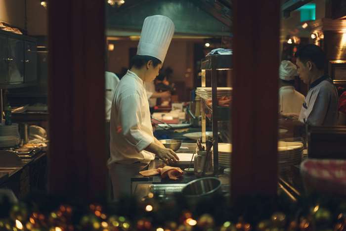 Chefs working in a kitchen in Vietnam 4K