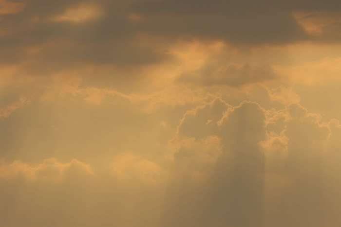Sunset clouds with sunrays 4K
