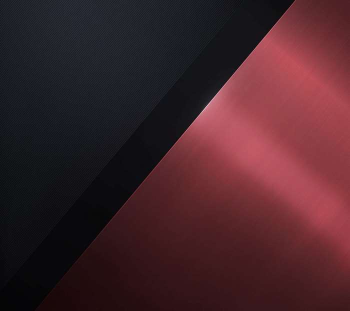 Dark textured surface and red metallic surface