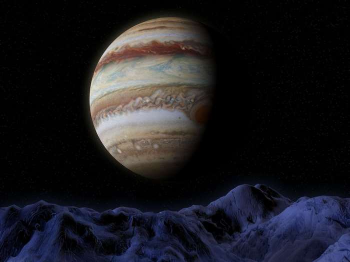 Jupiter and a rocky moon in space