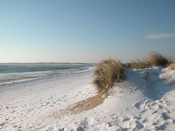 Snowy beach dunes on the North Sea coast in Germany