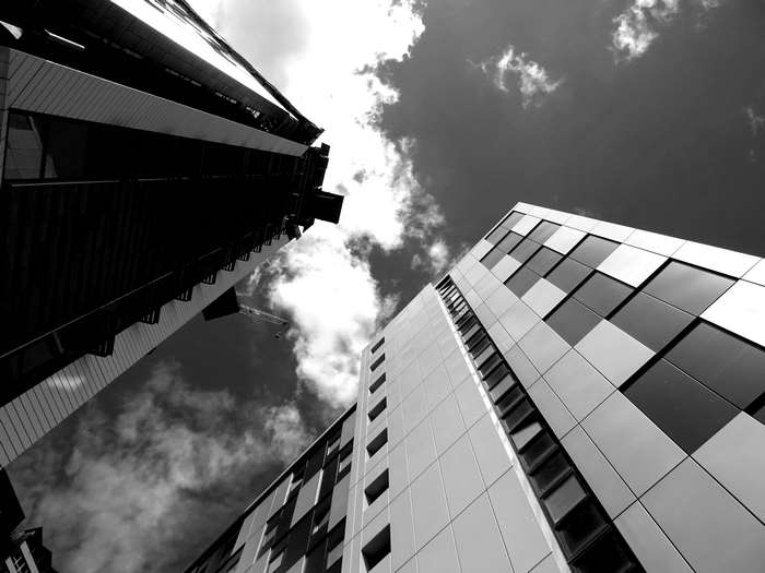 Modern skyscrapers against a cloudy sky