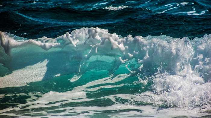 Ocean wave with seafoam