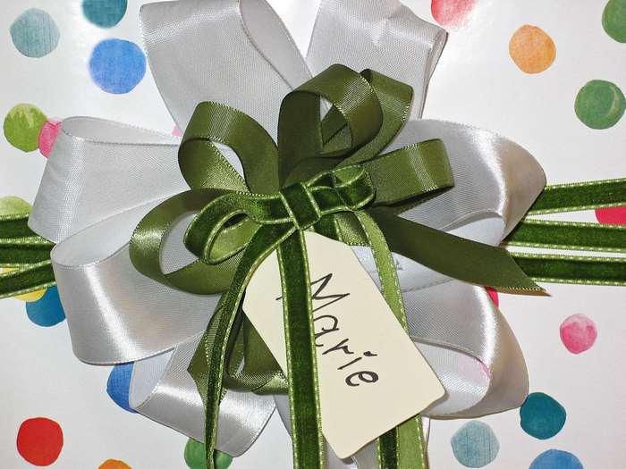 Gift wrapping with name tag 'Marie'