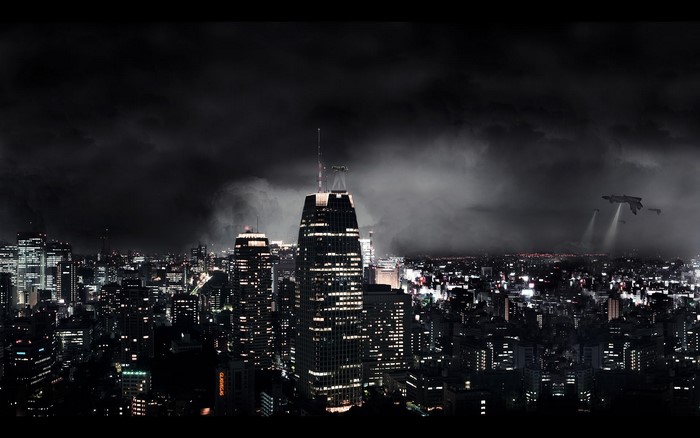Dark city skyline at night with flying vehicles