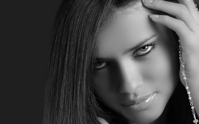 Adriana Lima close-up black and white portrait