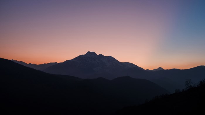 Mountains at sunset with gradient sky
