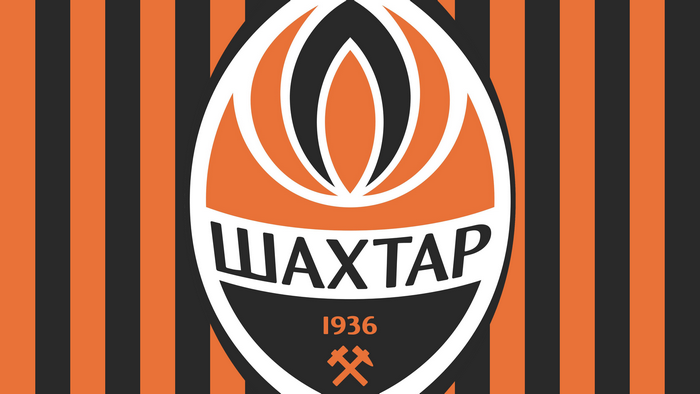 FC Shakhtar Donetsk logo with orange and black stripes