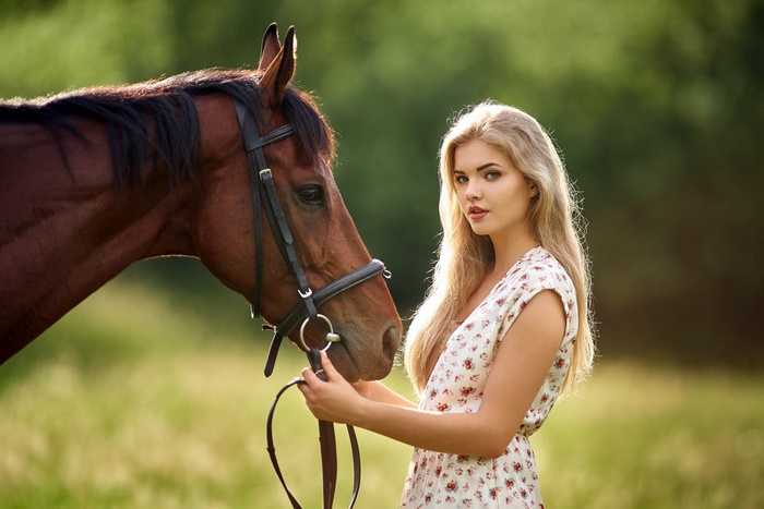 Blonde woman with a horse
