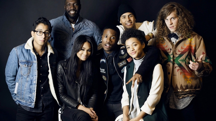 Group of actors posing for a photo