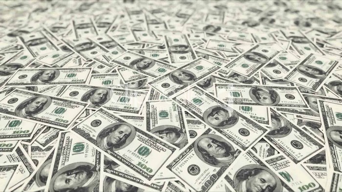 Scattered US Dollar Bills Close-up