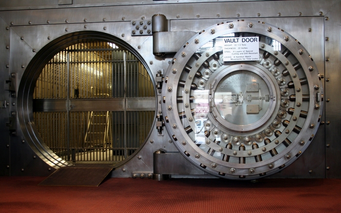 Vault door with intricate locking mechanism