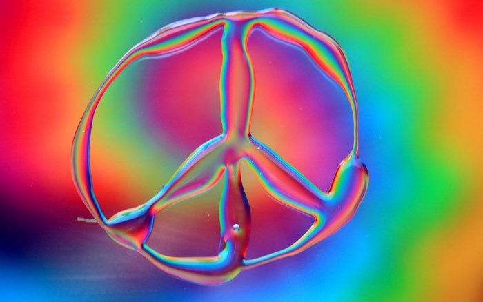Peace symbol made of rainbow colors