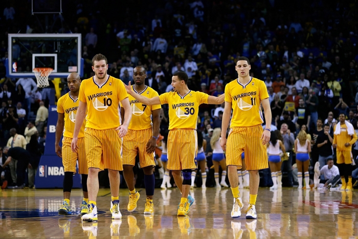 Golden State Warriors basketball players on court