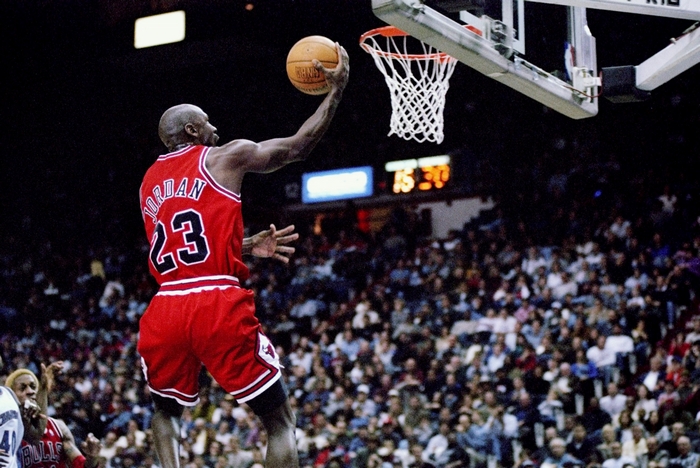 Michael Jordan of the Chicago Bulls dunks
