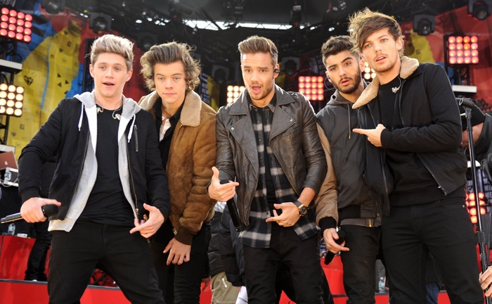 One Direction performing on stage