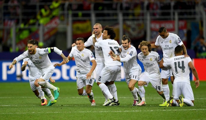 Real Madrid players celebrating a victory