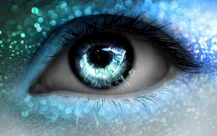 Close-up of a fantasy eye with blue glitter