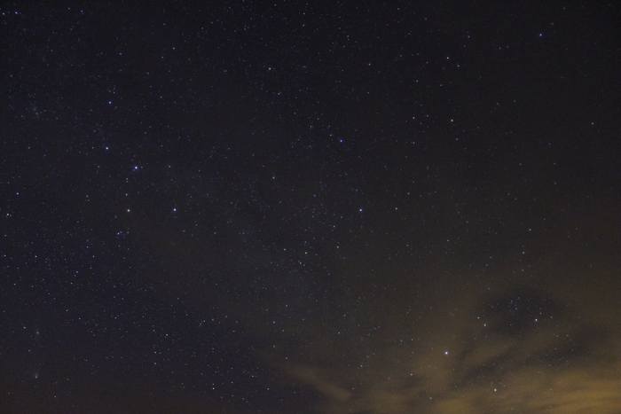 Night sky with stars and clouds
