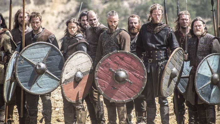 Vikings group with shields and spears
