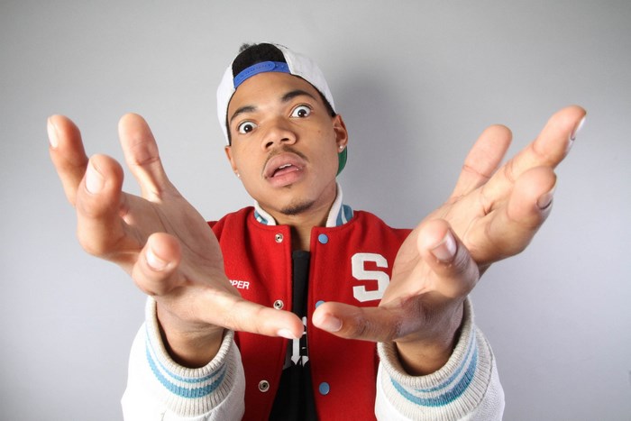 Chance the Rapper wearing a red jacket