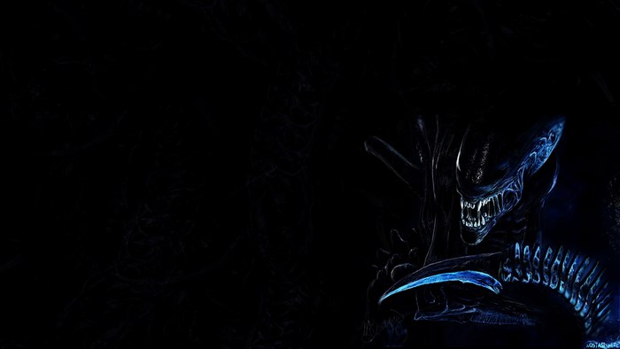 Alien creature in dark blue lighting