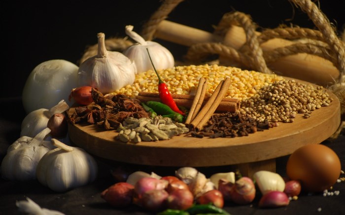 Herbs and spices with garlic, onions, and egg
