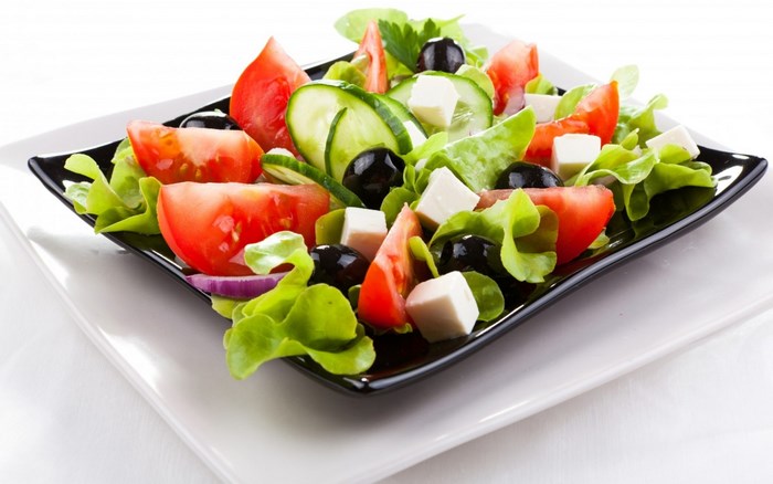 Greek salad with feta cheese and olives